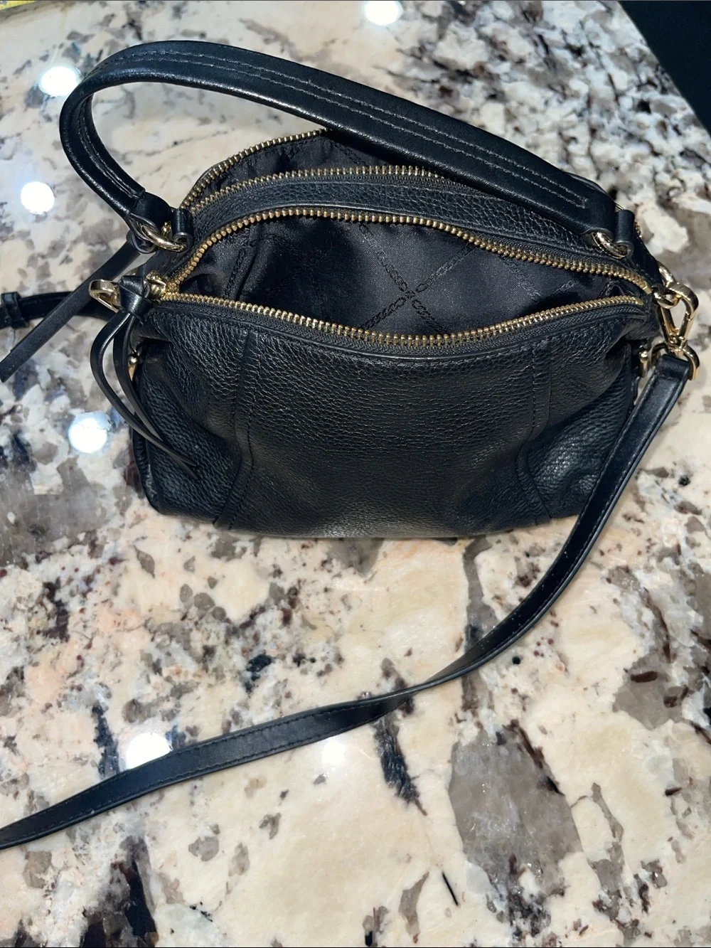 MICHAEL Michael Kors Black Leather Satchel with Gold Eyelet Accents